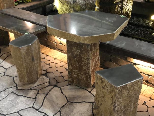 picture of custom stone fabricated chairs and table for outdoor seating