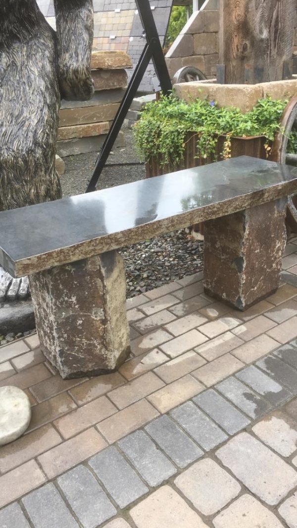 Custom fabricated bench out of natural stone on display at Gibson's Nursery and Landscape in Spokane, WA