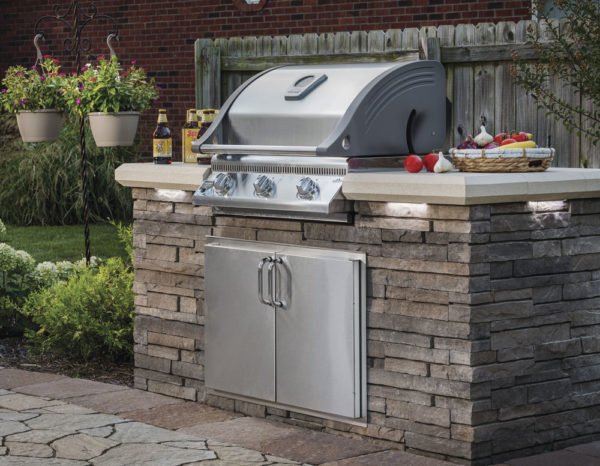 Outdoor patio with belgard elements grilling system